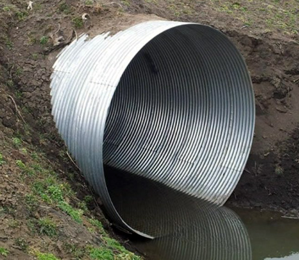 A non-fish-friendly culvert, raised above and disconnected from the streambed