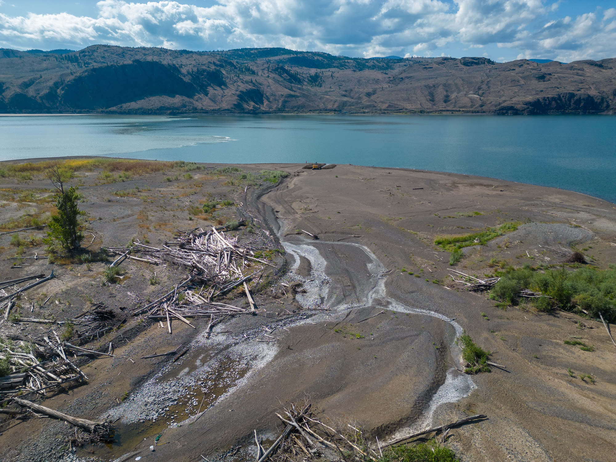 Exposed riverbed and stranded debris during the 2023 Tranquille River drought